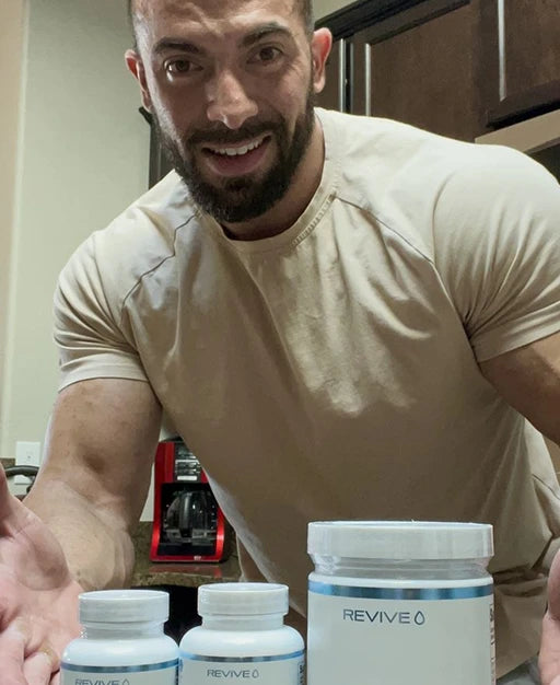 Customer holding a Revive product