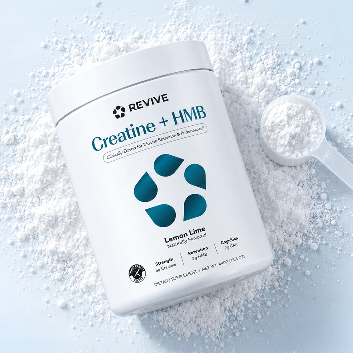 Creatine + HMB tub with a scoop of powder