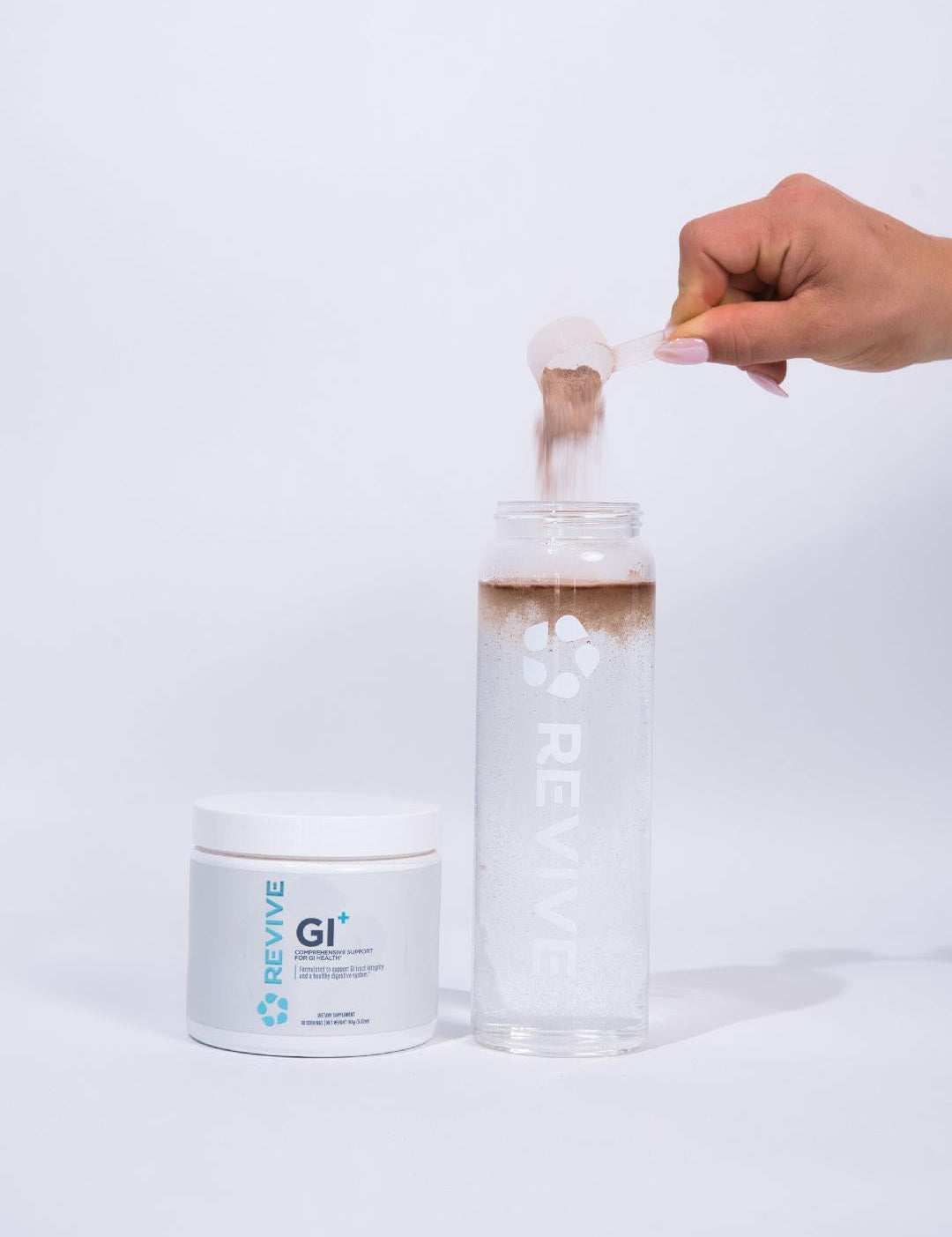 Woman Scooping GI+ Into canister