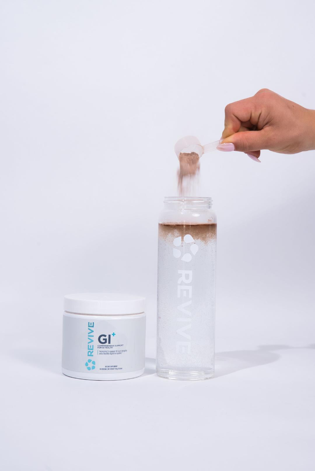 Woman Scooping GI+ Into canister