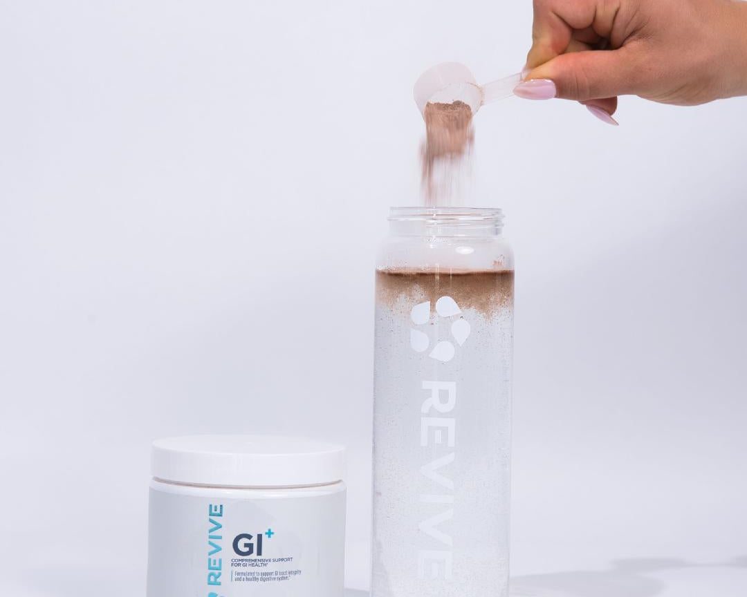 Woman Scooping GI+ Into canister