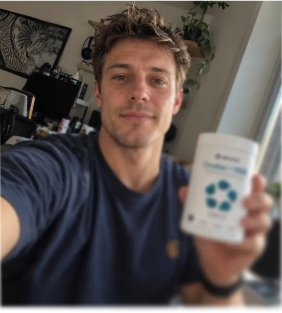 Customer holding a Revive product