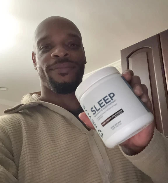 Customer holding a Revive product